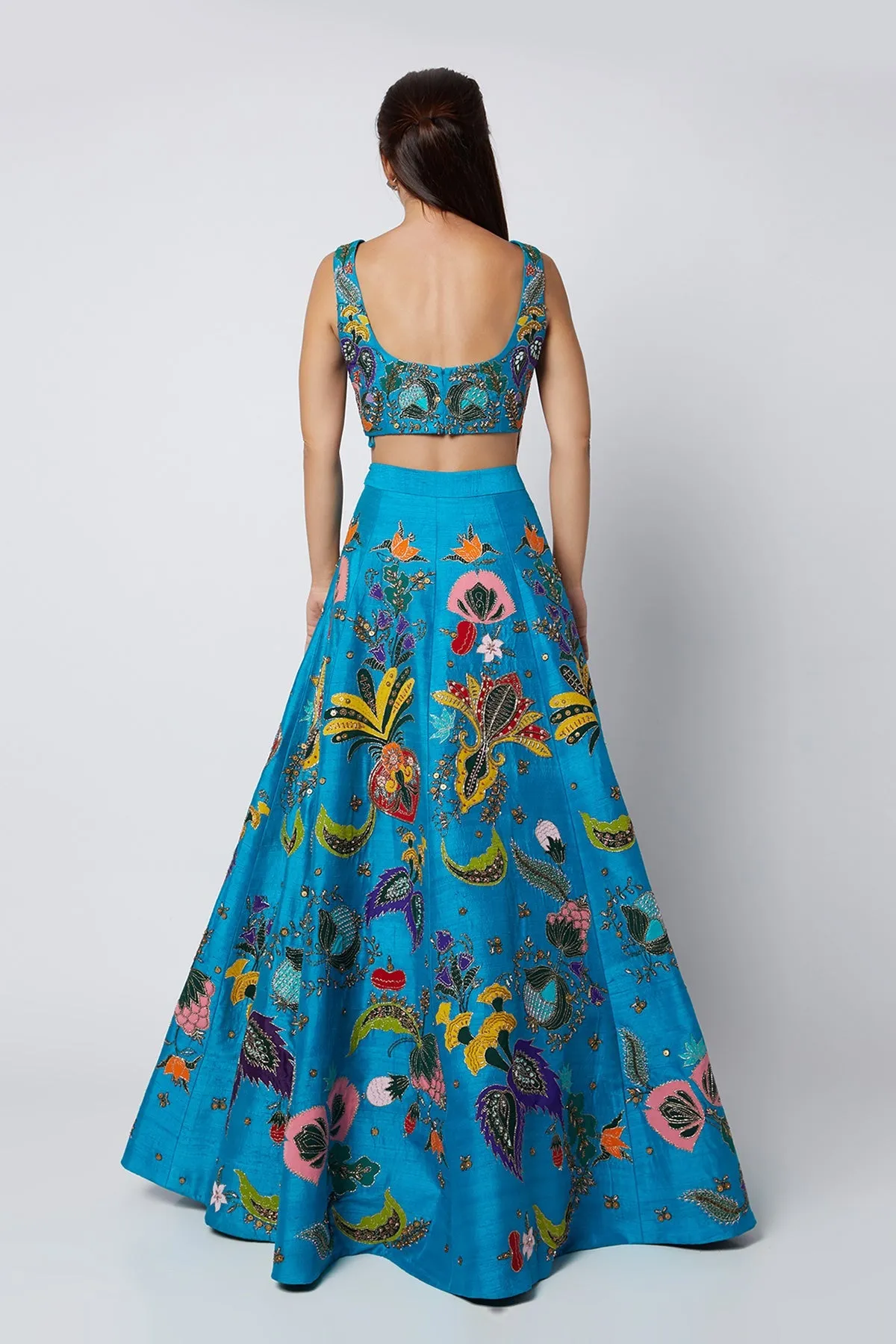 Cyan Blue Nadenka Raw Silk Appliquéd And Embellished Lehenga With Blouse And Cutwork Tulle Dupatta