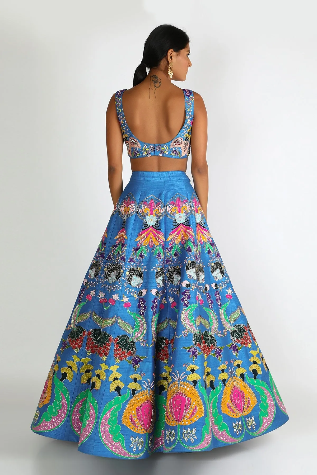 Cyan Blue Nadenka Raw Silk Appliquéd And Embellished Lehenga With Blouse And Cutwork Tulle Dupatta