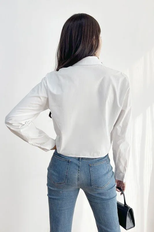 Embroidered button down white top