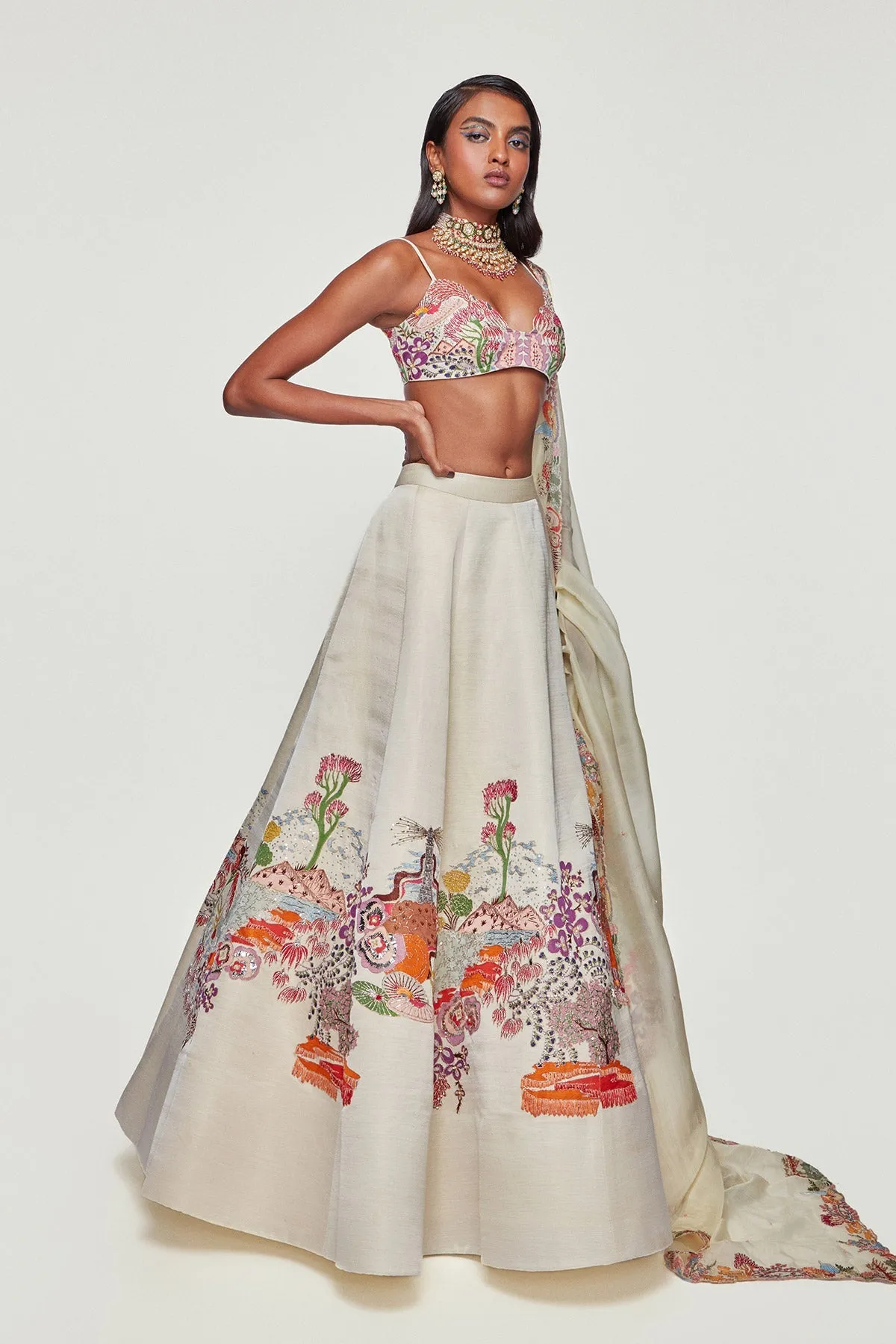 Ivory Divergence Silk Appliquéd And Embellished Lehenga With Blouse And Cutwork Organza Dupatta