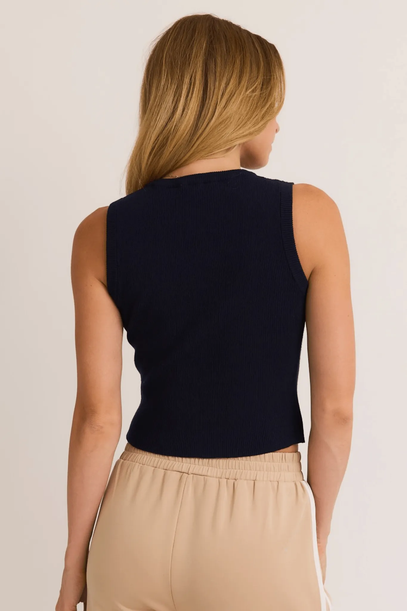 Sleeveless round neck button down ribbed sweater top